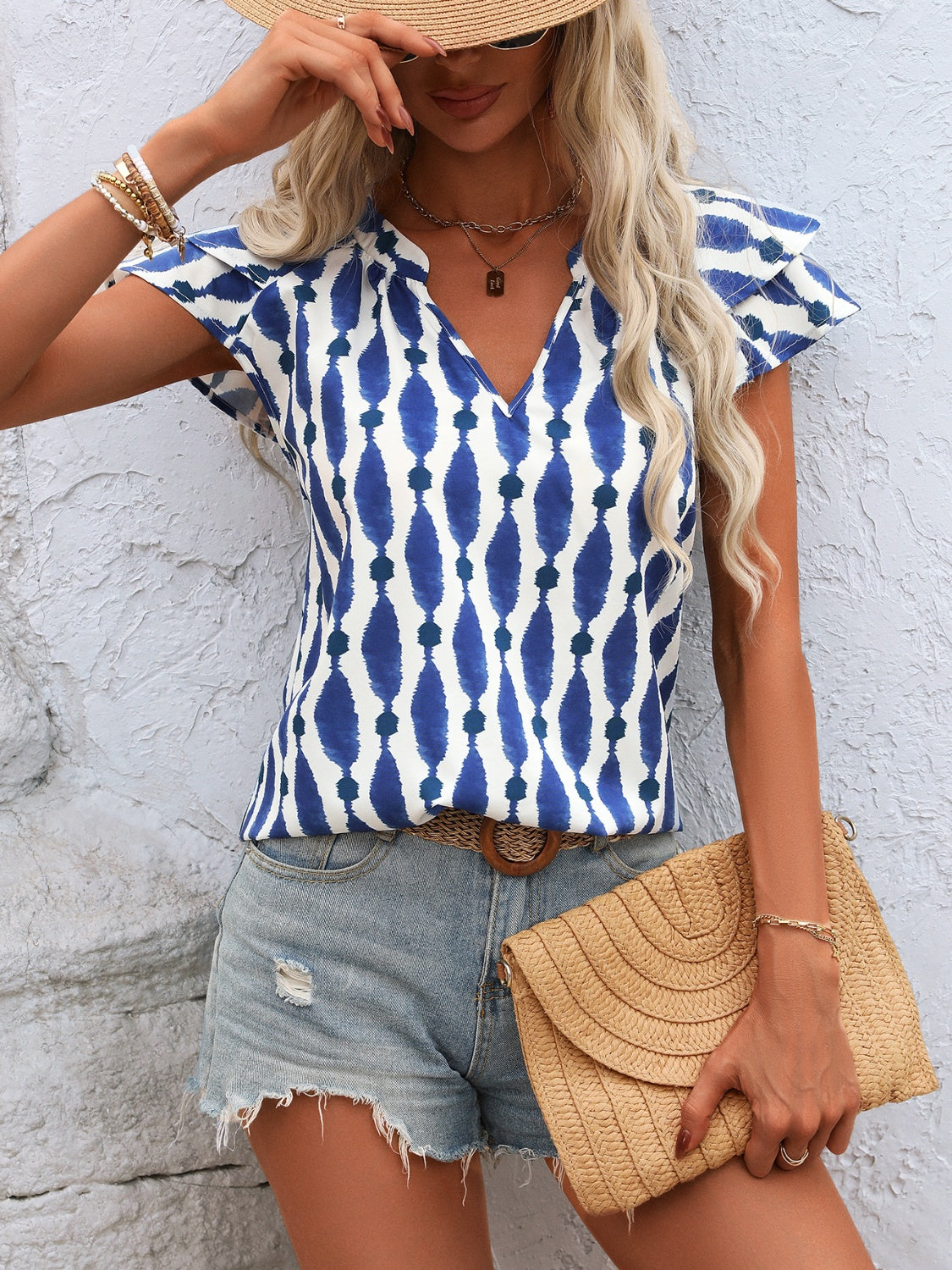 Ruffled Printed Notched Cap Sleeve Blouse